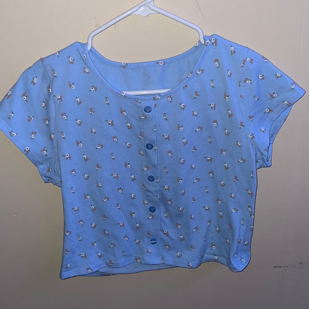 Blue shirt with flowers